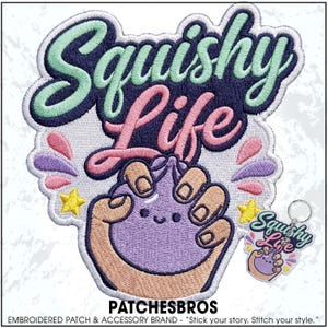 May include: An embroidered patch featuring the text Squishy Life in mint green and dark purple script. Below the text, a tan-colored hand squeezes a small, round, purple character with a smiling face. Pink and purple accents and yellow stars surround the central figure. A matching keychain version is visible in the bottom right corner.