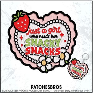 May include: Embroidered patch and keychain set with a heart-shaped design. The patch features the text "just a girl who needs her snacky snacks" with a strawberry and flower accents. The keychain mirrors the patch design.