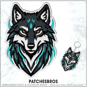 May include: Embroidered patch and keychain featuring a wolf design. The wolf has a black and gray color scheme with teal accents and orange eyes. The text "PATCHESBROS" is at the bottom, along with the brand's slogan.