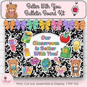 May include: A bulletin board kit featuring a black and white composition notebook pattern background. The central text reads "Our Classroom is Better With You!" surrounded by colourful illustrations of teddy bears, school supplies, and bows.