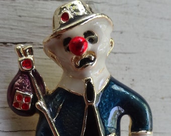 Vintage enameled sad creepy clown or hobo brooch