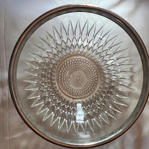 Vintage clear glass serving bowl with silver rim