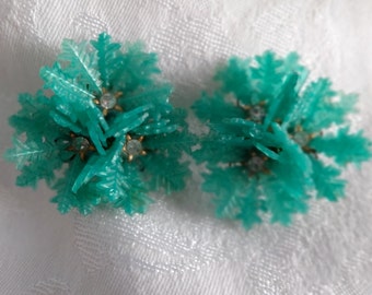 Earrings clip aqua soft plastic snowflake, pine boughs or flower clusters with rhinestone centers