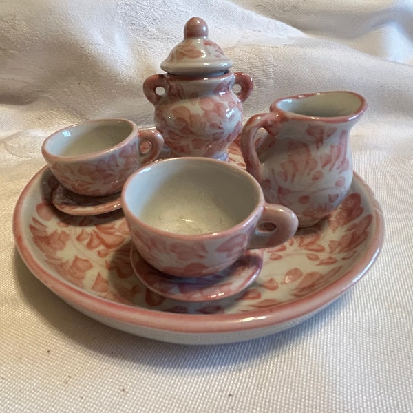 Charming vintage white and pink child's tea set two cups, two saucers, sugar bowl, cream pitcher and tray