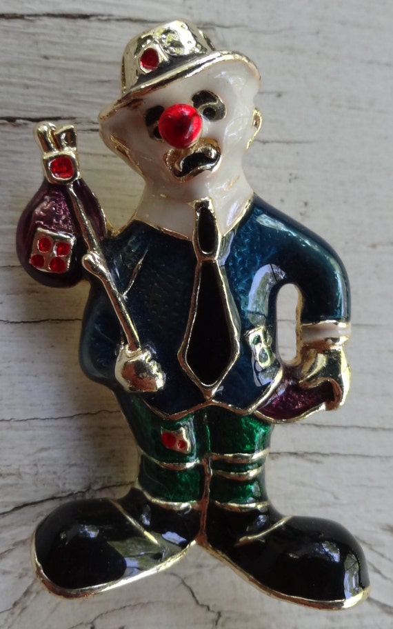 Vintage enameled sad creepy clown or hobo brooch