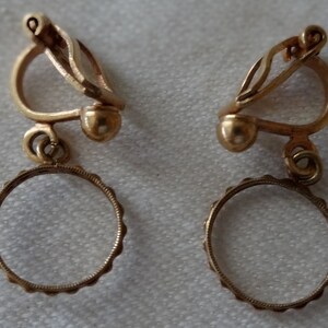 Vintage earrings with dainty gold tone dangly hoops