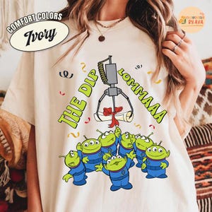 Disneyland Aliens Toy Story The Diploma Graduation 2026 Comfort Colors T-shirt, Graduate Shirt, Graduate Senior Gifts, 2026 Trip Matching Bild 1