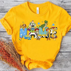 Camiseta personalizada de Toy Story con nombre, camiseta personalizada de Buzz, Woody y Jessie de Disneyland, camiseta personalizada para niño y niña, viaje familiar a Disneyland 2026 imagen 5
