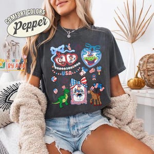 Coquette Bows Toy Story Characters USA 250th Anniversary Shirt, Pixar Toy Story 4th of July Shirt, Disneyland Independence Day Gift image 2