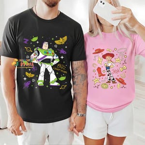 Comfort Colors Jessie And Buzz Lightyear Infinity Love Couples T-Shirt, Pixar Toy Story Land Shirt, Toy Story 5, Disneyland Family Trip 2026 image 1