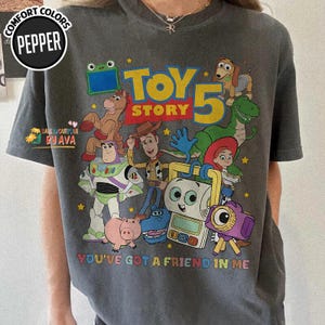 Disneyland Pixar Toy Story 5 You've Got A Friend In Me June 19 Shirt, Woody Buzz Etch Lenny Mr Spell Lilypad, Family Vacation 2026 Trip image 6