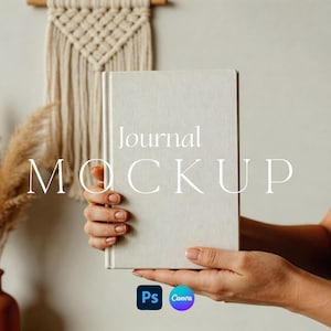 May include: A light-colored journal mockup held by a person. The journal has the words "journal MOCKUP" printed on the cover. A vase with dried plants and a macrame wall hanging are in the background. The image also includes the logos for Photoshop and Canva.