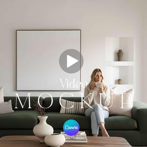 May include: A living room scene featuring a dark green sofa with decorative pillows and a wooden coffee table. A large framed canvas hangs on the wall. The word "MOCKUP" is displayed in large white letters. A woman is sitting on the sofa.
