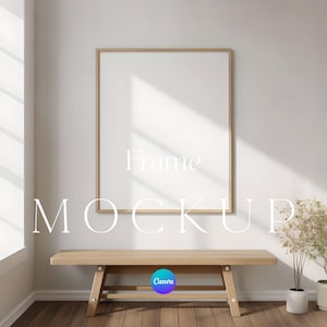 May include: A wooden bench with a framed white canvas, a plant in a white pot, and the text "Frame Mockup" against a white wall. The room has a window with sunlight.