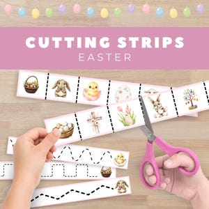 May include: Pink scissors cutting Easter-themed cutting strips. The strips feature illustrations of Easter eggs, bunnies, chicks, and baskets. The text "CUTTING STRIPS EASTER" is displayed above the strips. A hand holds a strip with cutting practice lines.
