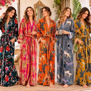 May include: Five long-sleeved robes featuring various patterns: a dark green floral print, a pink and orange striped animal print, an orange palm and leopard print, a grey animal print, and a yellow palm and leopard print, all with waist ties.