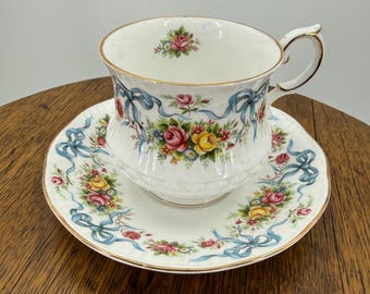 Vintage 50s-60s Queen's Rosina Bone China Blue Ribbons Roses Teacup Saucer Set