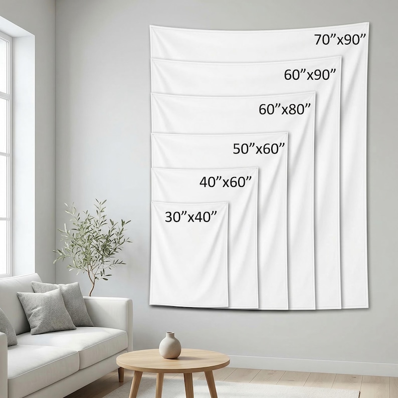 Op de afbeelding: Een display van witte rechthoekige wandkleden in verschillende maten, waaronder 76 cm x 102 cm, 102 cm x 152 cm, 127 cm x 152 cm, 152 cm x 203 cm, 152 cm x 228 cm en 178 cm x 228 cm. De wandkleden hangen aan een lichtgekleurde muur.