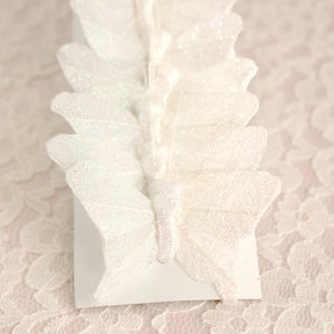 White Shimmer Glitter Feather Butterflies One Dozen 2 Inch Wingspan Size Bridal Bouquet Wedding Decor Baby Shower Floral Crafts Birthday