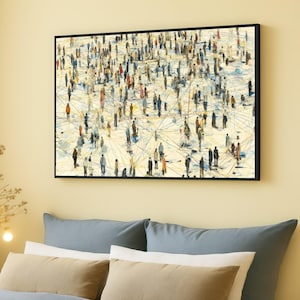 May include: A framed abstract painting showing a crowd of people in shades of blue, orange, and black. The artwork features interconnected lines and a neutral background, suggesting community and connection. The black frame provides a modern aesthetic.