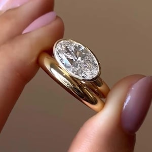 East to West Bezel Set Oval Cut Moissanite Bridal Ring Set 14k Yellow Gold 3.00 Lab Diamond Plain Wedding Band Ring Set For Anniversary Gift