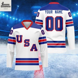 A white and blue USA hockey jersey with the number 00, featuring the text "USA" on the front.