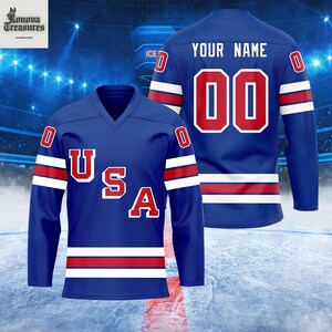 A blue hockey jersey with the text "USA" on the front and "YOUR NAME" on the back, along with the number "00" displayed on the back.