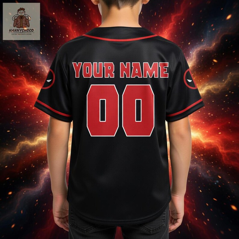 the back of a person wearing a black baseball jersey with the text "YOUR NAME 00" printed on it.