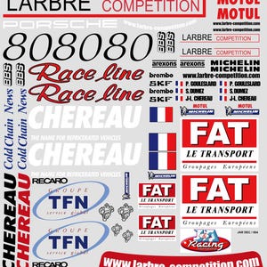 May include: A collection of racing-themed decals featuring the "LARBRE COMPETITION" logo, sponsor names, and various racing-related graphics. The decals include the number "808080", "Race line" text, and the French flag. The color scheme is primarily red, white, and black.