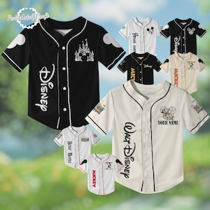 a collection of Disney-themed baseball jerseys and caps, with various designs and colors.