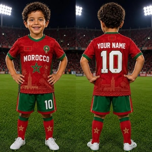 May include: A red and green soccer uniform featuring the text MOROCCO and a green star on the front, with the text YOUR NAME and the number 10 on the back. The set includes a short-sleeved jersey, shorts with the number 10, and red socks with stars.