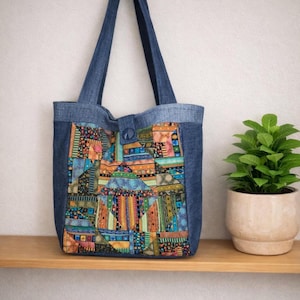 Handmade Denim Bag/Unique Fabric Shoulder Bag/Printed Patchwork Panel and Denim Pocket Detail/Upcycled Jeans/Tab and Magnetic Clasp to close