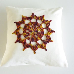 Crochet motif cushion compass design white cotton with gorgeous autumn coloured motif image 2