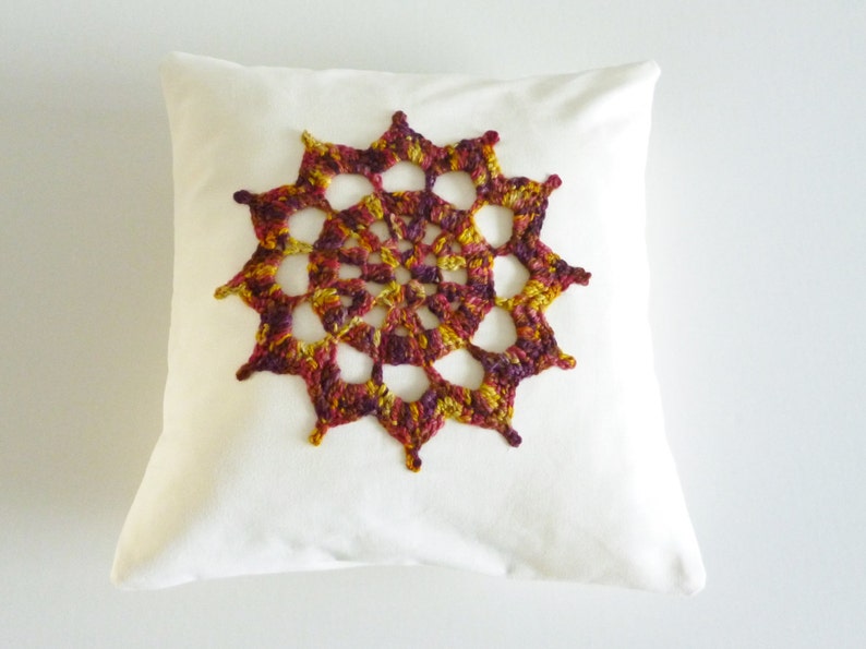 Crochet motif cushion compass design white cotton with gorgeous autumn coloured motif image 2