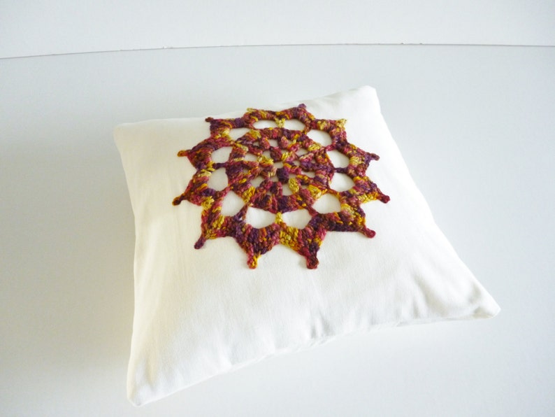 Crochet motif cushion compass design white cotton with gorgeous autumn coloured motif image 5