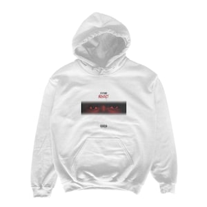 May include: White hooded sweatshirt with a front pocket and drawstring. The front features the text "FUTURE HONEST" in red above a rectangular image of eyes. Below the image is a parental advisory warning.