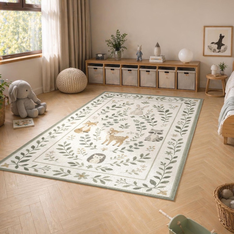 a cozy and well-decorated nursery room with a large rug featuring a forest scene, a stuffed animal, and various decorative elements such as plants, vases, and books.