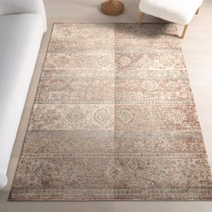 Vintage lapptäckesmatta, terrakottatryck med slitet blommönster, bohemisk inredning