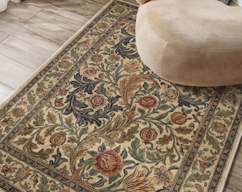 May include: A rectangular area rug featuring a cream-colored background with a dense, intricate pattern of scrolling acanthus leaves, blooming flowers in shades of red and orange, and pomegranate motifs, framed by a decorative floral border.