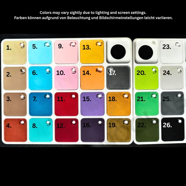 May include: A color swatch palette featuring twenty-six numbered square samples in various hues including beige, blue, pink, yellow, orange, red, purple, green, gray, and black. Some squares have a smooth finish while others show a textured pattern.