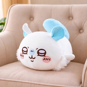 May include: A set of three ceramic mugs with a speckled, matte finish. The mugs are in shades of cream, light gray, and dark gray. Each mug has a simple, minimalist design and a rounded handle.