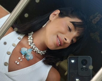 Gargantilla de orquídea phanelopsis natural preservada en resina.