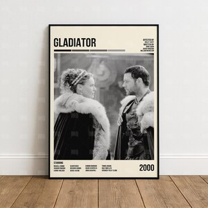 Könnte beinhalten: Ein gerahmtes Schwarz-Weiß-Filmposter für den Film "Gladiator". Das Poster zeigt zwei Schauspieler in historischen Kostümen, mit dem Titel "Gladiator" oben. Das Jahr "2000" wird unten rechts angezeigt.