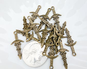 50PC Antiqued Bronze 3D Metal Sword Charms Pendants 28x13mm