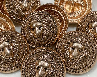 Bottone rotondo decorato leone con gambo in poliestere art. B0284 conf. 10 pezzi