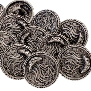 May include: A collection of silver-toned metal buttons. Each button features a detailed jellyfish design within a textured circle, surrounded by a rope-like border. The buttons are clustered together, showcasing their intricate aquatic theme.