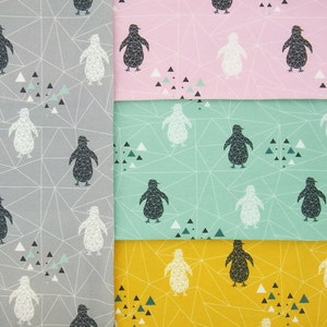 May include: Fabric samples with a geometric penguin pattern. The fabric is available in grey, pink, mint green, and yellow. Each fabric features white and black penguins, triangles, and a geometric grid design.
