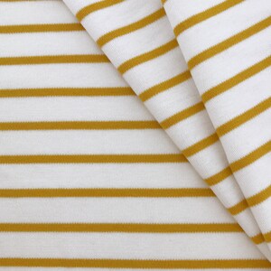 May include: White fabric with horizontal yellow stripes. The fabric is folded in half, showing the stripes on both sides.