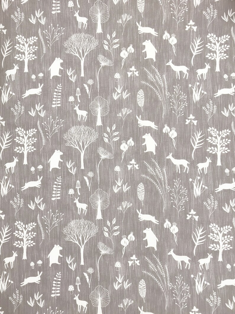 May include: A seamless pattern featuring white silhouettes of animals, trees, and plants on a gray background. The pattern includes bears, deer, rabbits, trees, and various floral elements.