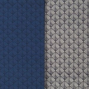 May include: A split image showing two fabric patterns. The left side has a deep navy blue geometric design, and the right side displays a similar pattern in grey and white. The repeating pattern resembles stylised leaves or feathers.